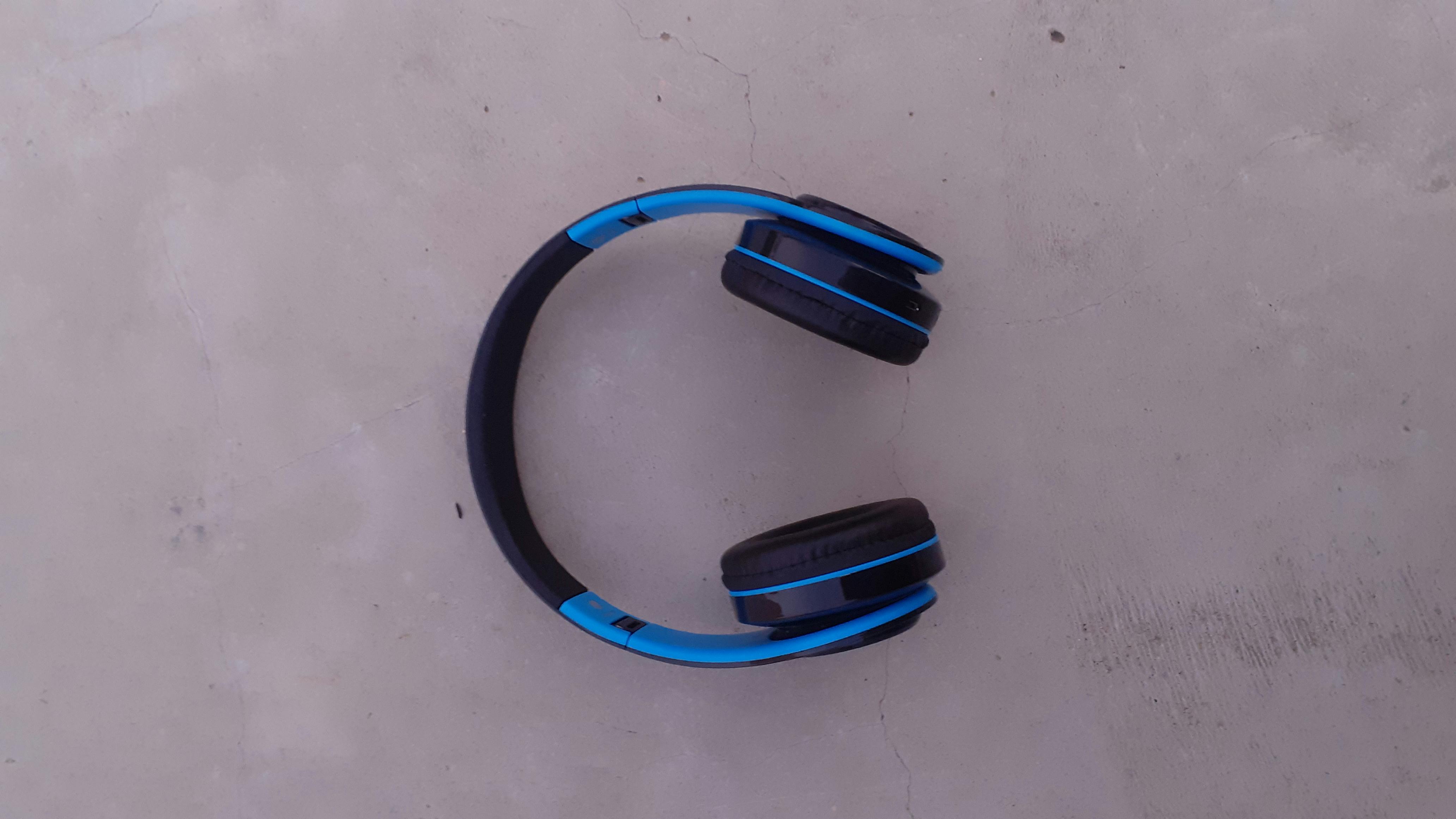 Person practicing yoga on a beach at sunset