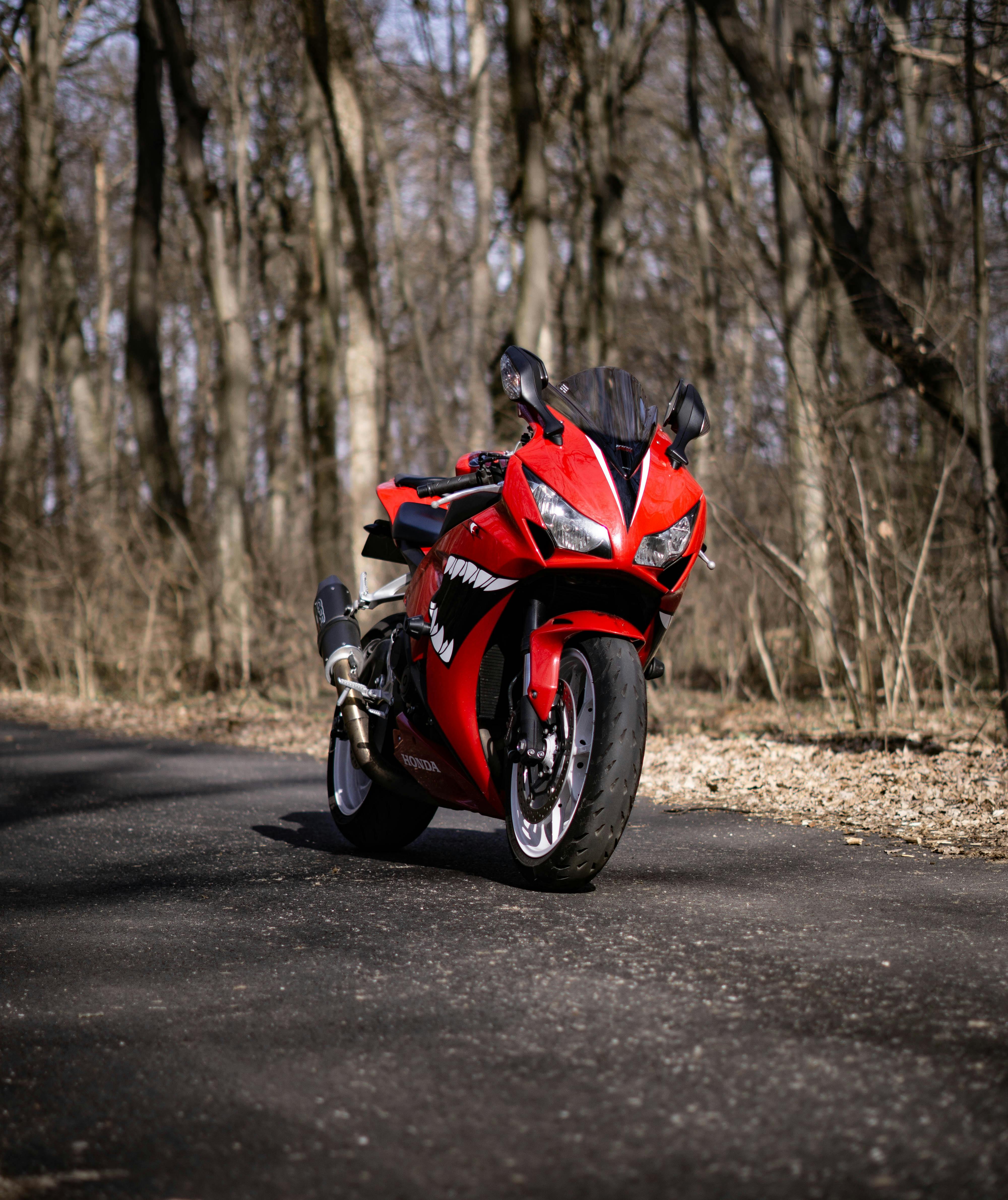 A Red Motorcycle Parked on the Road · Free Stock Photo A Red Motorcycle Parked on the Road · Free Stock Photo