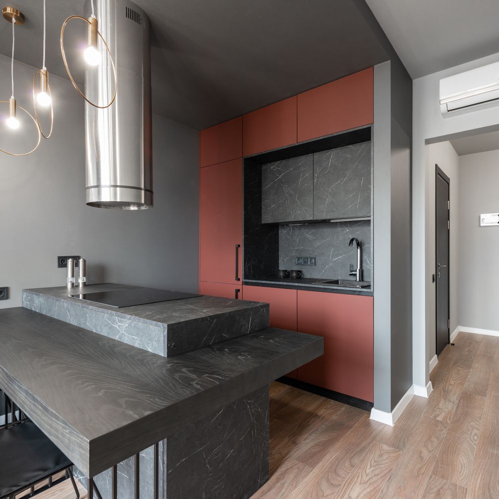 Kitchen Spraying in Wanstead — careful masking before painting begins