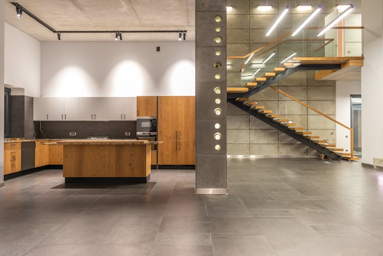 Interior Of Modern House With Kitchen And Staircase