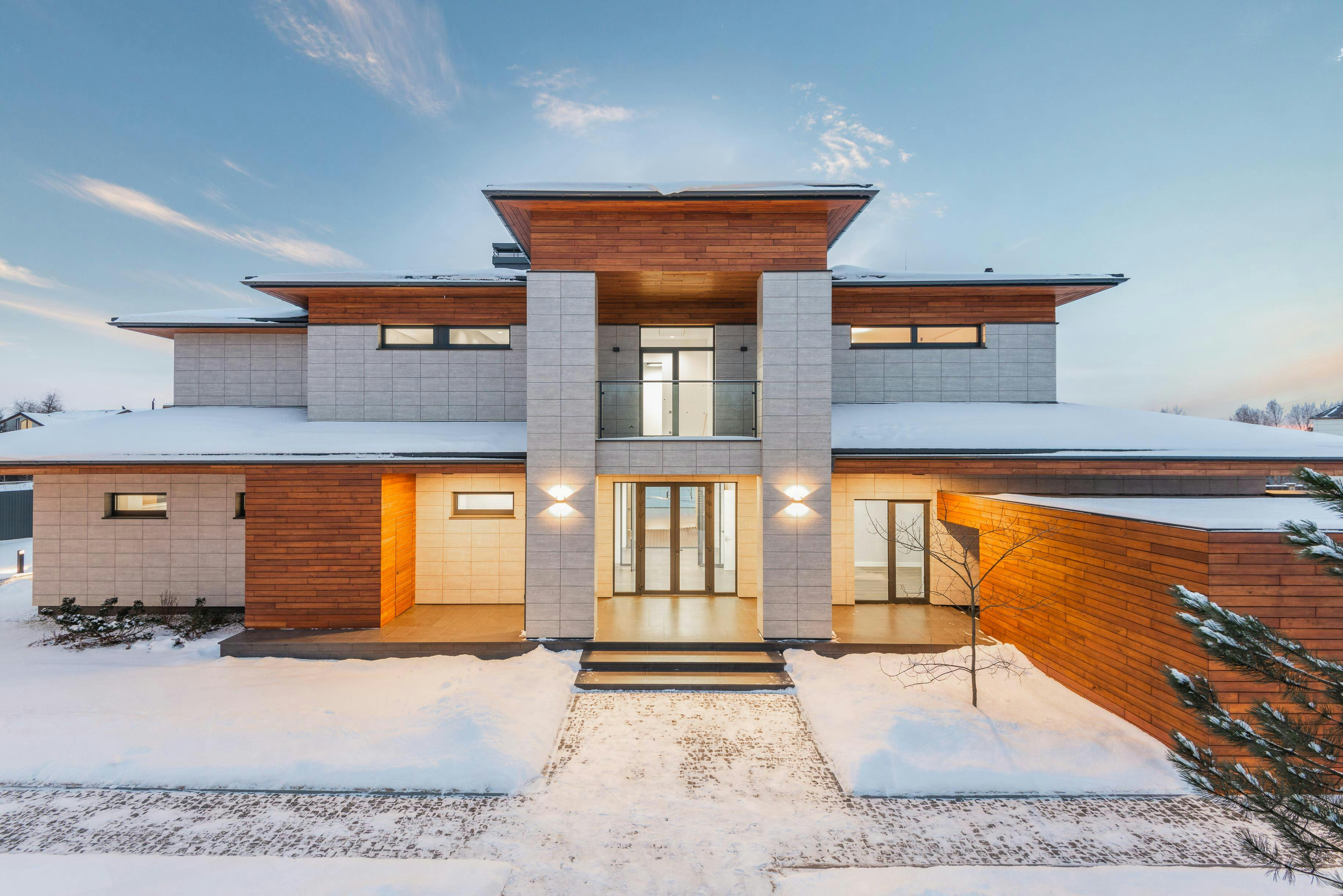 contemporary country house facade in winter