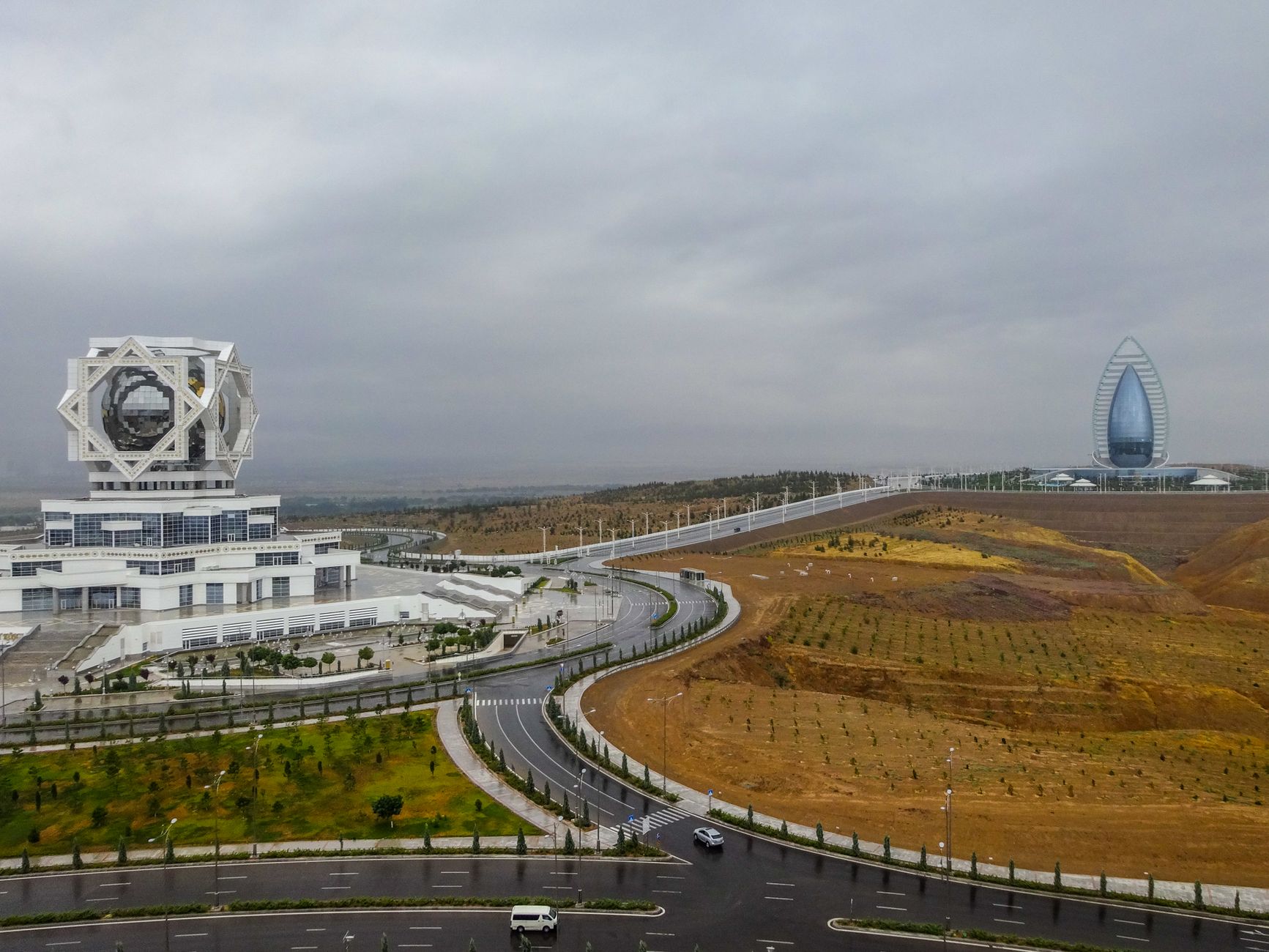 Aerial view of the Wedding Palace and Yyldyz Hotel in Ashgabat, Turkmenistan.. Photo by Nikolai Kolosov on Pexels