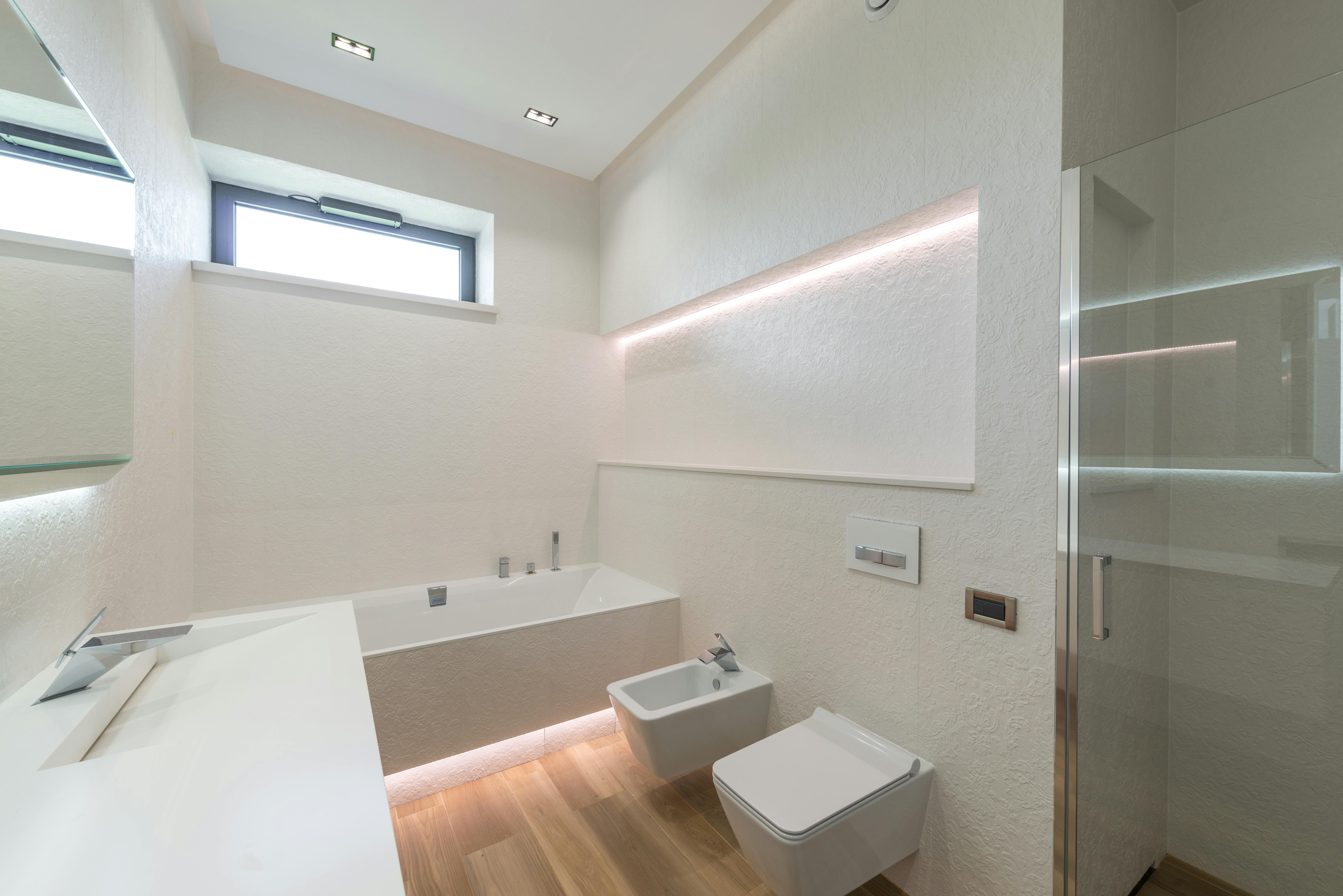 Interior of a luxury portable restroom trailer with high-end finishes - portable bathroom trailers cost