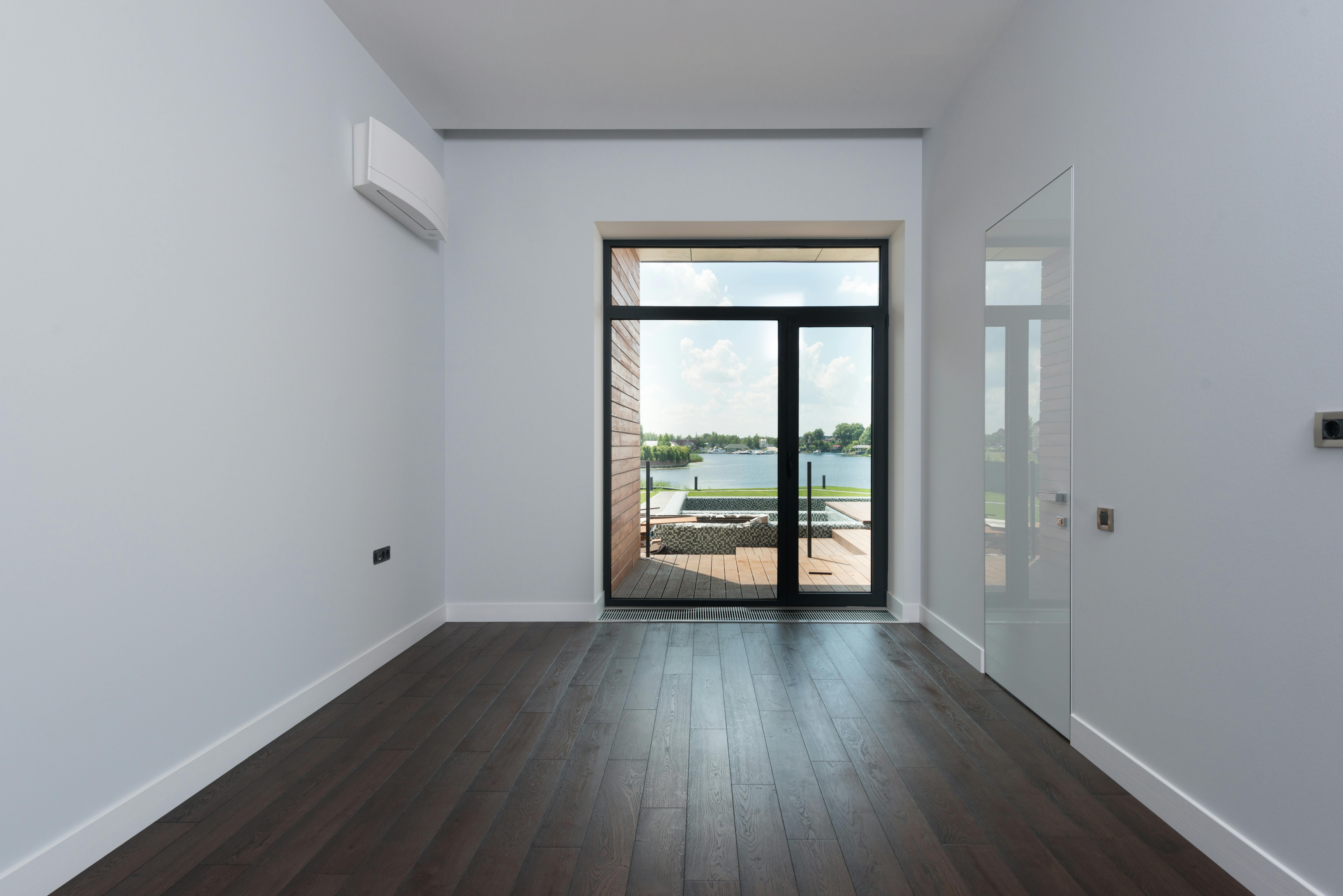 empty hall of modern house with windows
