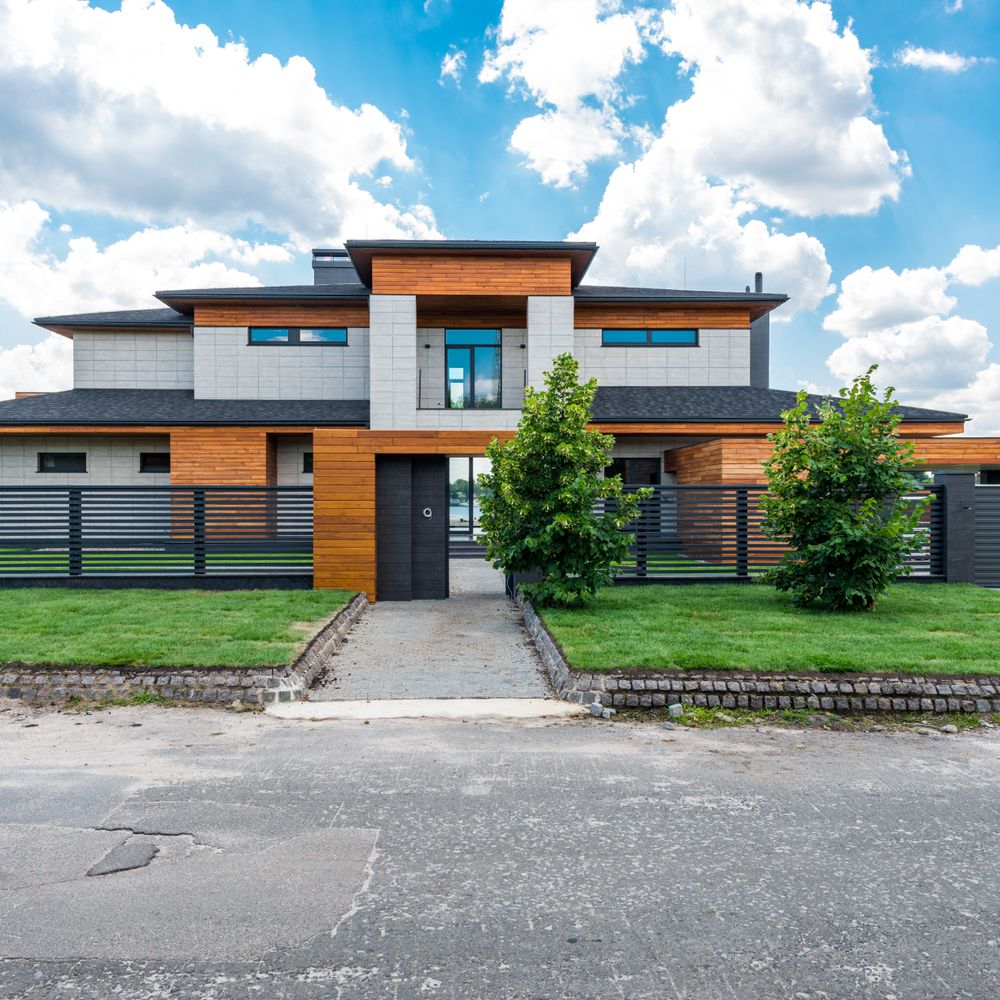 Exterior Painting in Bell Green — walls rolled to an even, flat finish