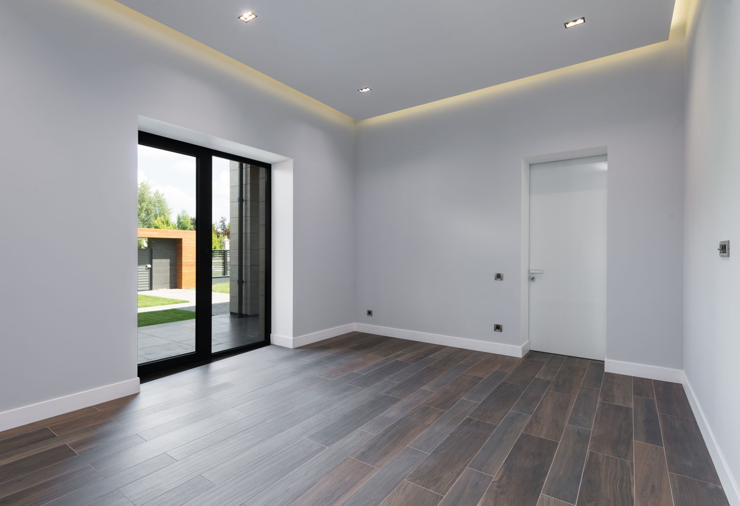 Plastering and Skimming in West Hackney — quality trade paint going on in two coats