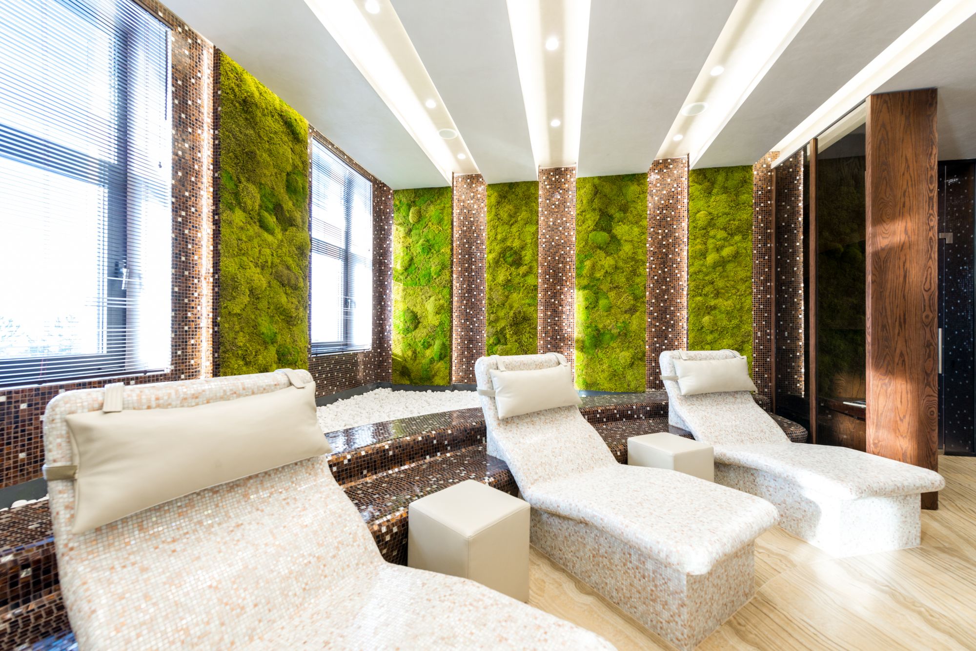 Calm waiting area with soft seating and natural textures