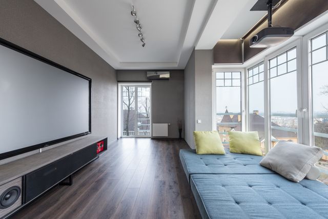 Living room with a projector screen — Max Vakhtbovych on Pexels