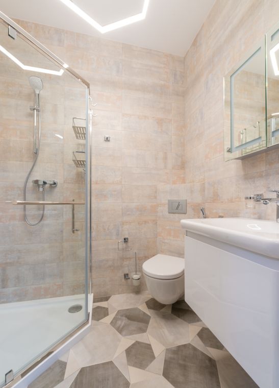Reglazed shower and tile wall in a Bronx bathroom