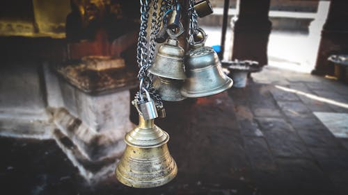 Free Four Gray Hanged Bells Stock Photo