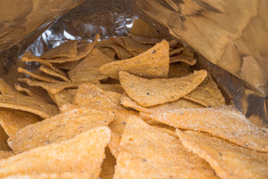 Metallised zipper pouches of namkeen and chips ready for retail