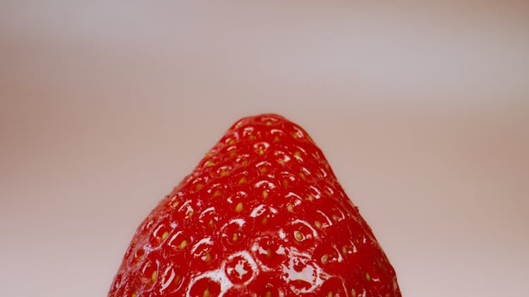 Strawberry On Pink Surface