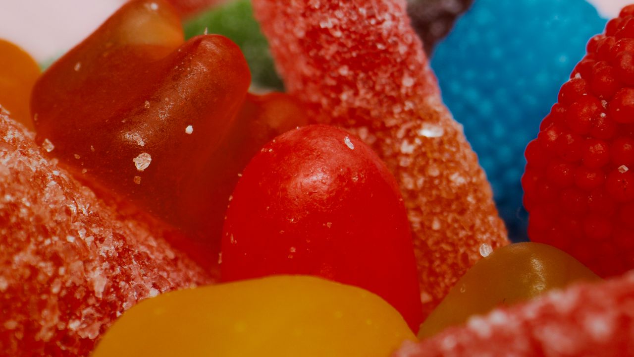 vibrant assortment of sugary gummy candies up close showcasing texture