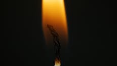 Close-Up Photo of a Burning Candle Wick