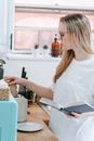 Woman with book making toasts