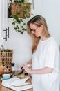 Young woman preparing breakfast at home
