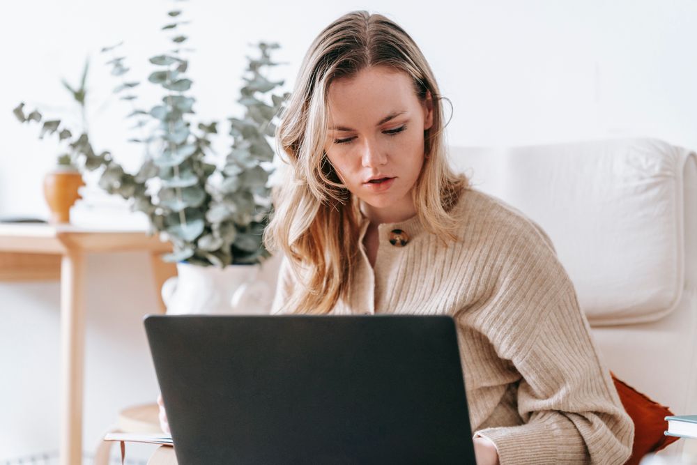 Person earning online from a laptop