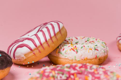 Close-Up Photo of Colorful Doughnuts