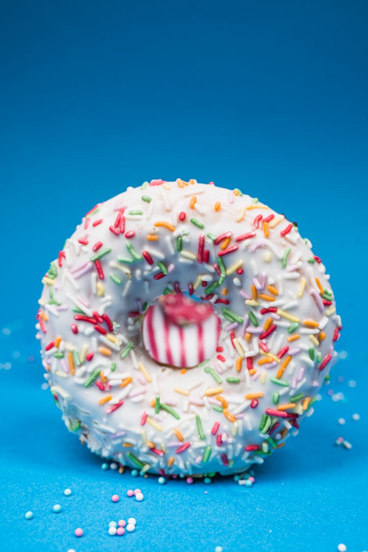 A White Donut With Sprinkles