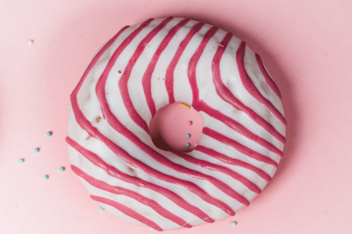 Close-Up of a Red and White Donut