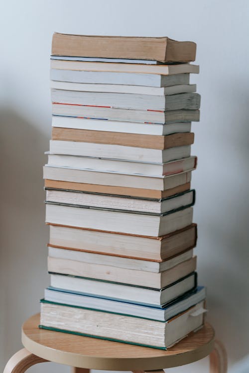 Free Stack of Books on Wooden Stool Stock Photo