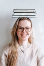 Woman in White Button Up Shirt Wearing Black Framed Eyeglasses