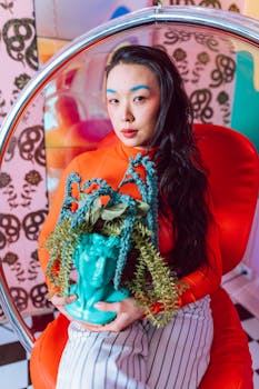 Colorful portrait featuring unique makeup, bold fashion, and artistic decor.