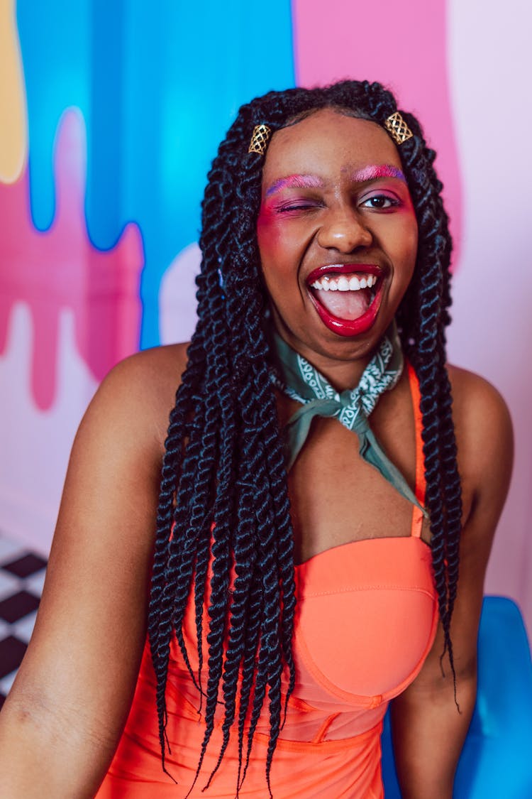 Close-Up Shot Of A Woman With Braided Hairstyle