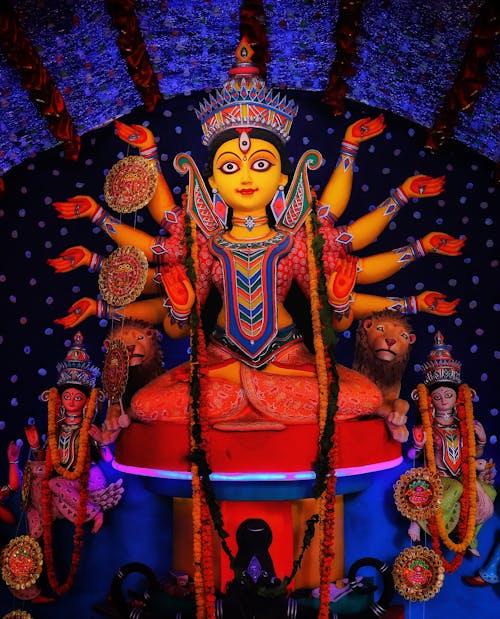 Free Hindu Deity Statue With Blue and Red Lights Stock Photo