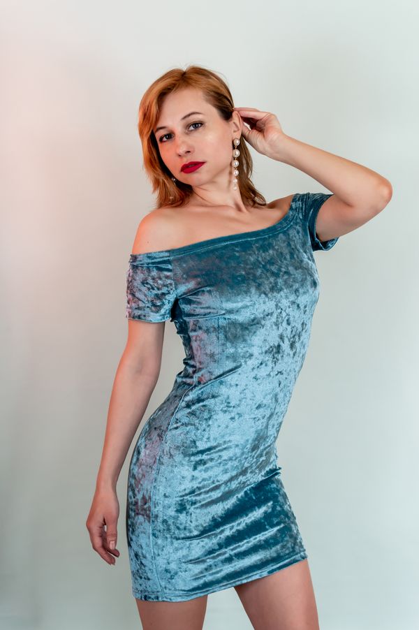 Woman in emerald velvet dress
