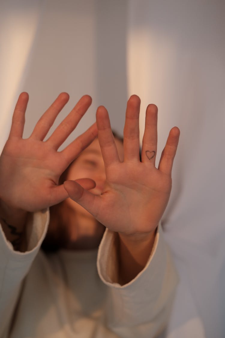 Anonymous Woman Showing Stop Gesture