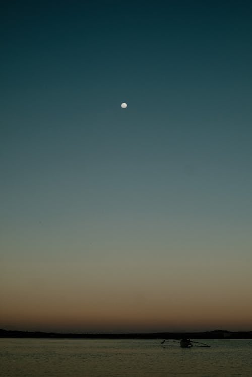 Moon Over Sea Late in Evening