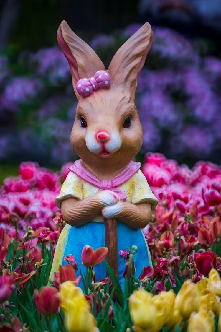 Porcelain Bunny Statue In Flower Field