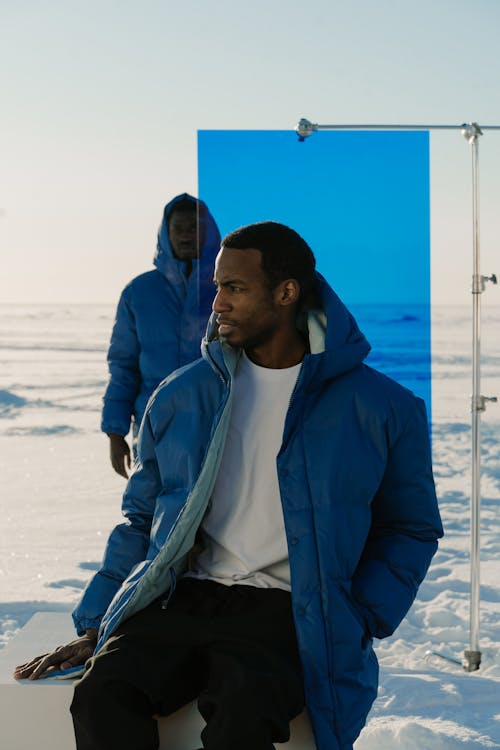 Male Models Projecting Nicely on a Snow Covered Ground