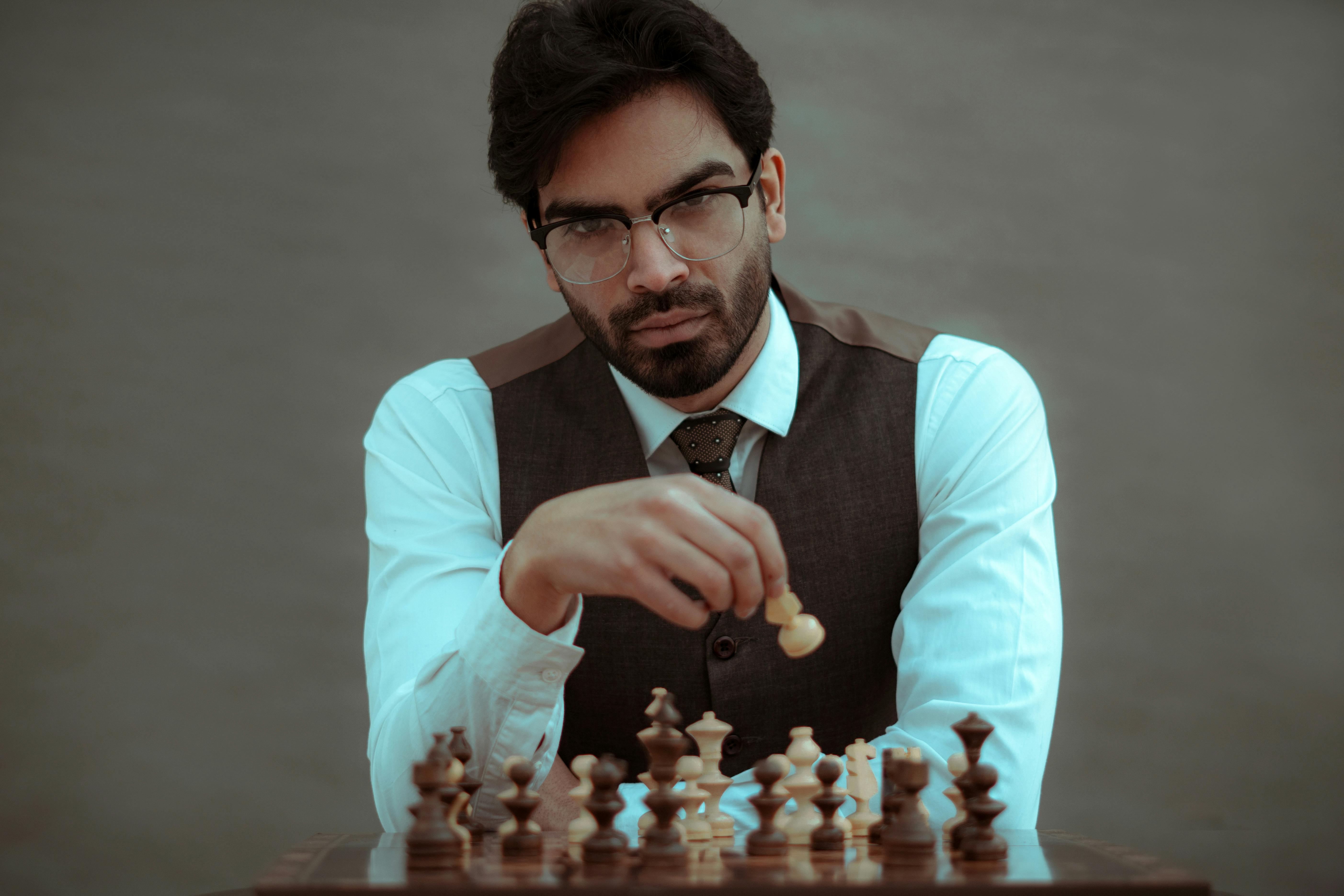 Consummate Focused Chess Player In Glasses Thinking On Next Move Stock  Photo - Download Image Now - iStock