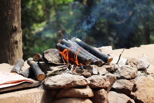 Burning Firewood on Rock