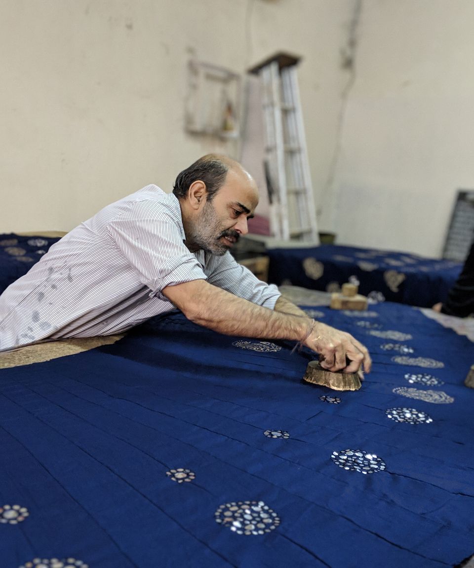 An artisan block printing fabric in Jaipur