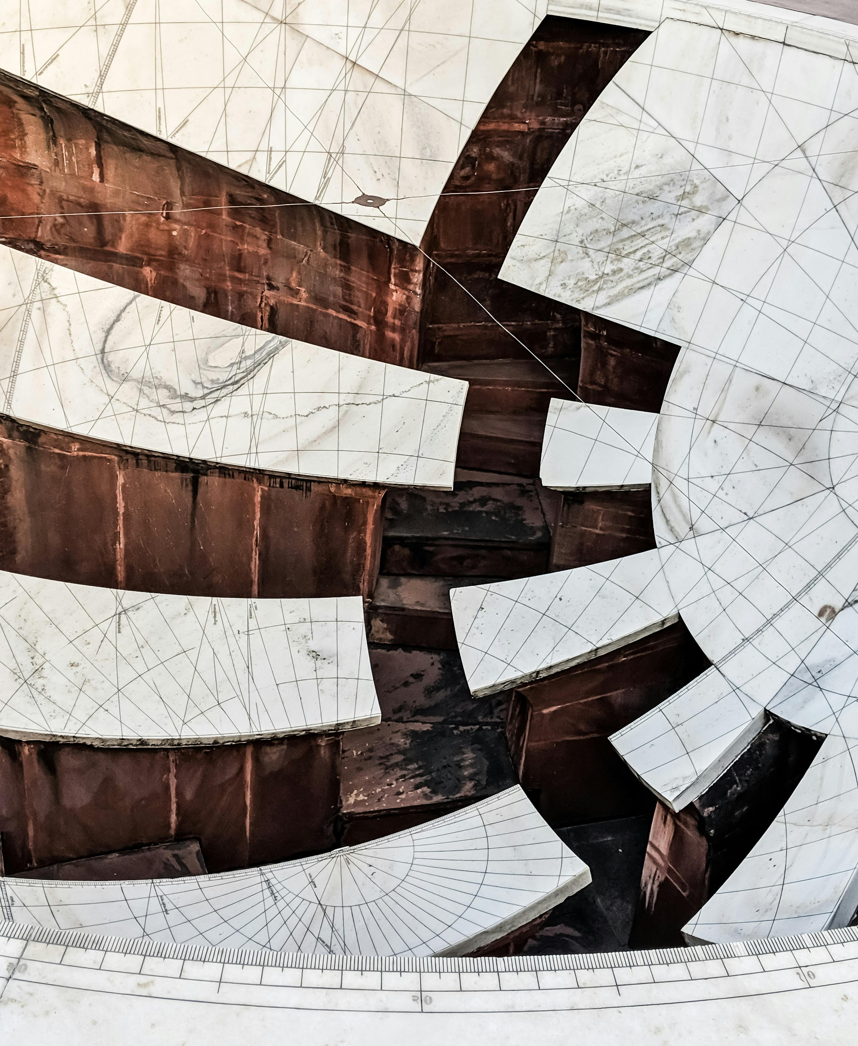 Abstract view of a modern architectural ceiling with geometric shapes and lines.