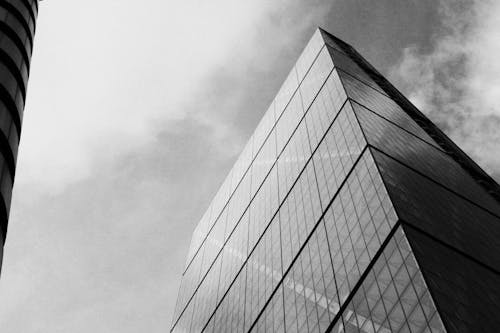 Foto profissional grátis de arranha-céu, contemporâneo, edifício de vidro