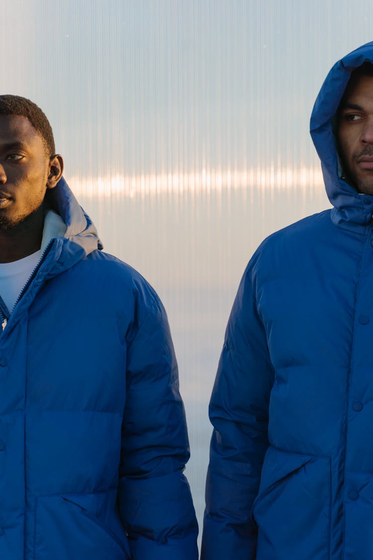 Men Wearing Blue Puffer Jackets 