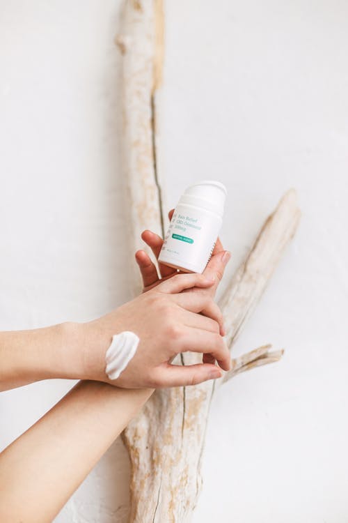 Close-up of Woman Holding a Hand Cream 