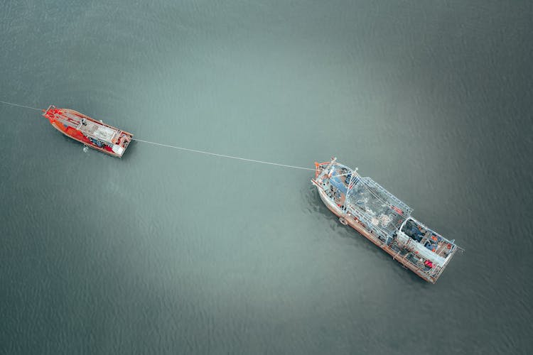 Barge And Boat On Rippling Water