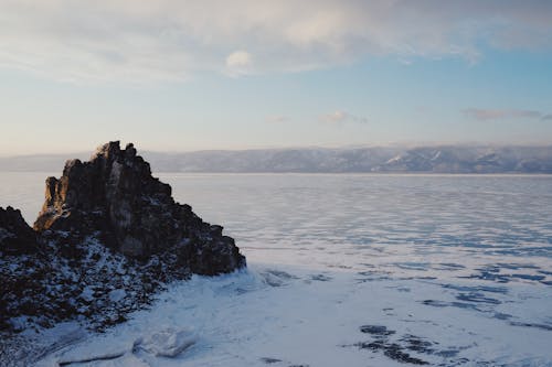 Rock Mountain Above the Frozen Lake