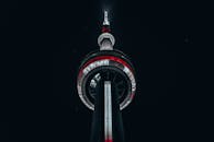 Black and Red Tower during Night Time
