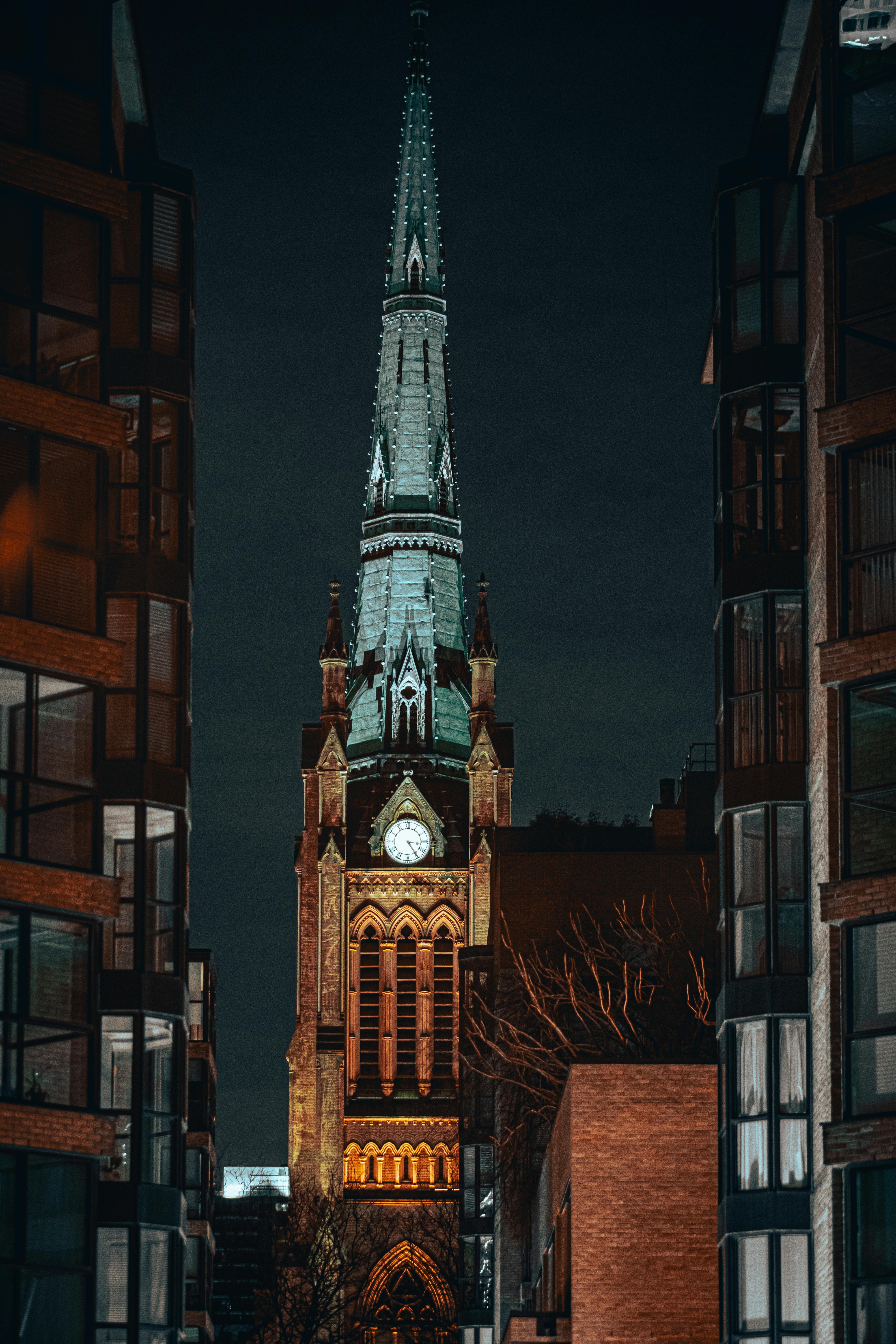 brown concrete building during night time