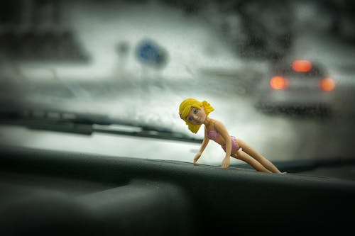Free stock photo of barbie, blonde hair, blurred road