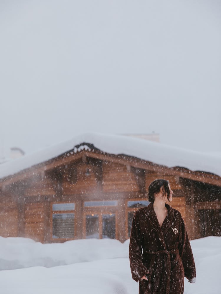 Woman In Fur Coat Outside In Winter