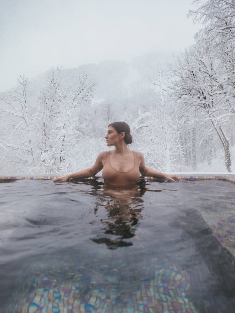 Woman In The Pool During Winter