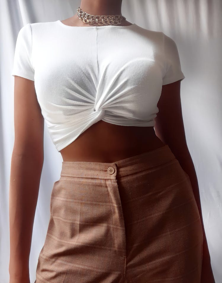 A Woman In White Crop Top Shirt