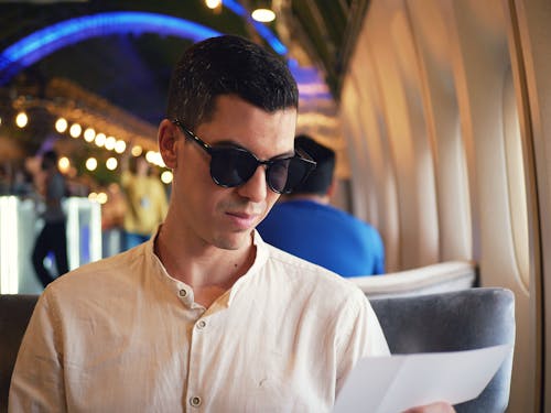 Close-Up shot of a Man Wearing Black Sunglasses